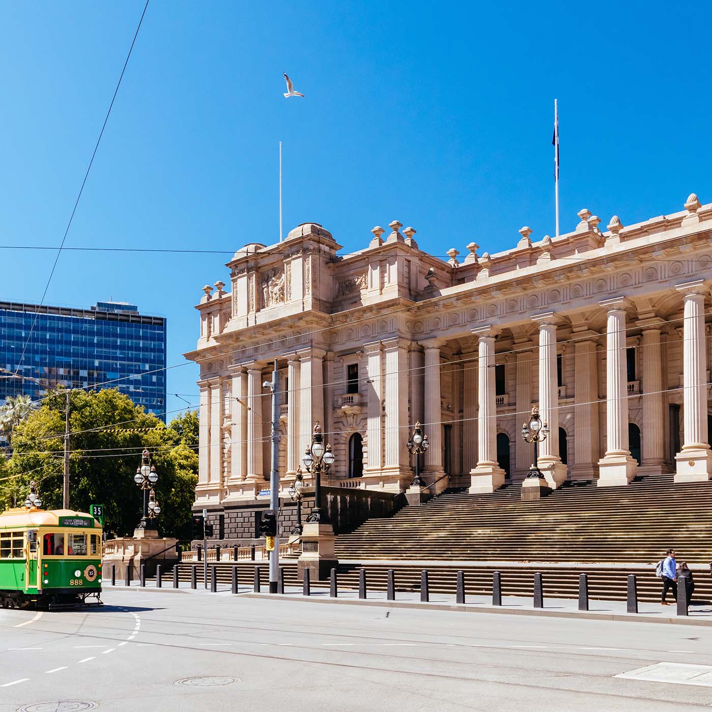 City Circle tram in front of Parliament House for the state of Victoria in Melbourne CBD, Victoria, Australia City Circle tram in front of Parliament House for the state of Victoria in Melbourne CBD, Victoria, Australia